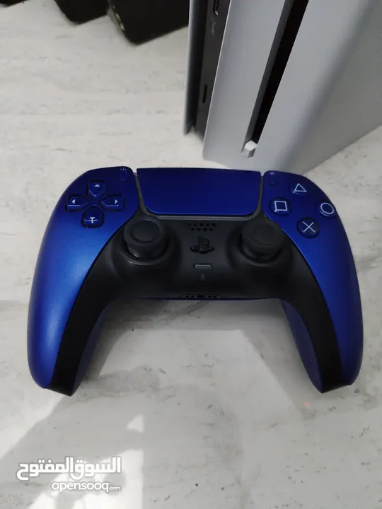 بلاستيشن 5 سلم ps5 slim مع مجموعة العاب وادين ثنتين اصليات ..................................