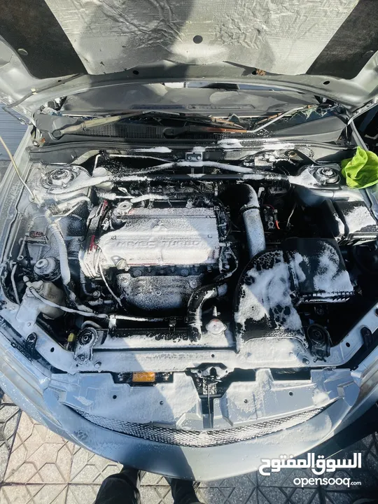 Mitsubishi Lancer Evolution 9  وارد اليابان ممشى قليل بحالة ممتازه متوفره كامله
