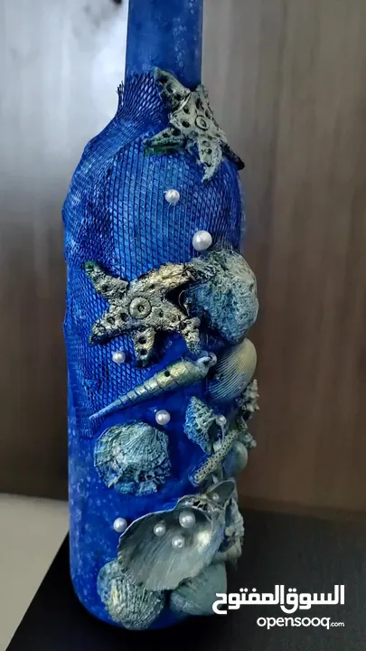 Sea shell bottle art