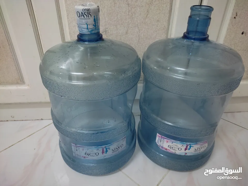 2  empty OASIS water bottle  sale in Alkhoud. Each bottle RO 2.