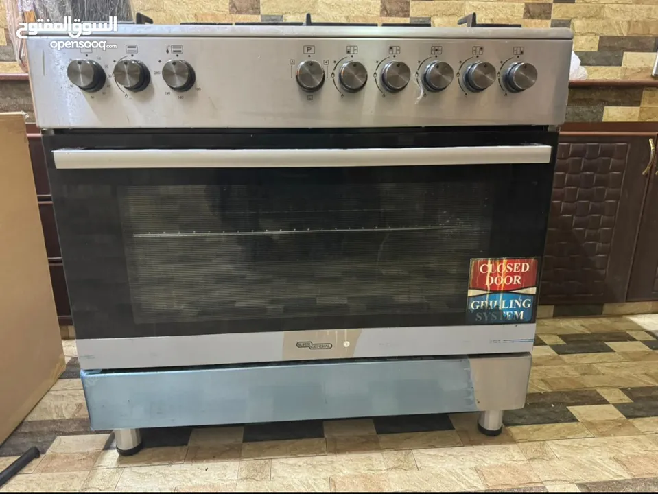 super general stove with 5 burner.  It is 9 month used and in good condition