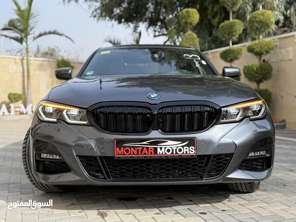 ترخيص 2022 BMW  330e  محرك 2000 هايبرد plug in/يقطع على الشحنه 50 كيلو متر  297 حصان