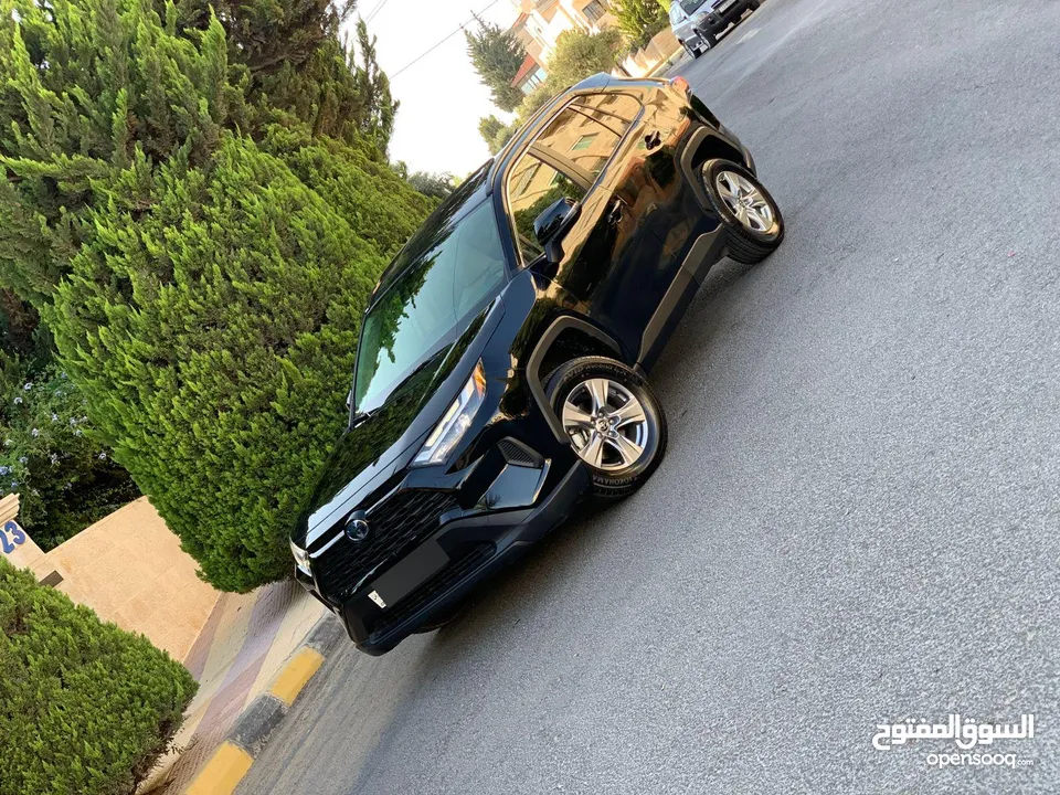 تيوتا رافور هايبرد 2023 xle لون اسود ملوكي جمرك اليوم اعلى صنف