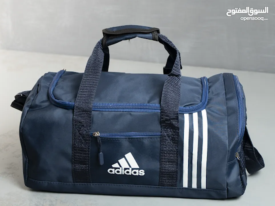 شنطه جيم adidas (مخزن257) حقيبة adidas متعددة الاستخدامات hand & cross bag سوستة كبيرة سوستة امامية