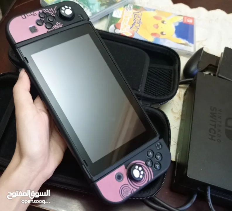 نينتندو سويتش OLED (مستعمل كالجديد) + لعبتين nintendo switch oled