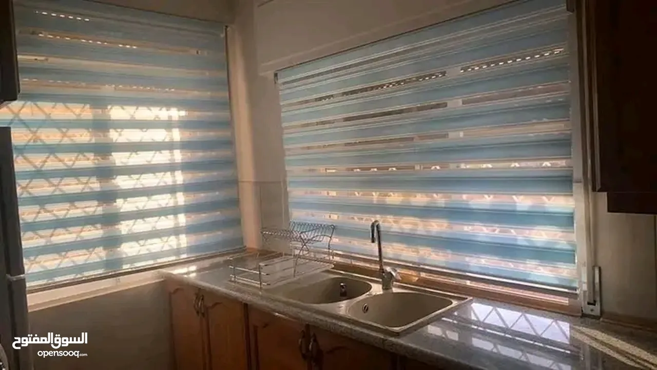 ستائر زيبرا