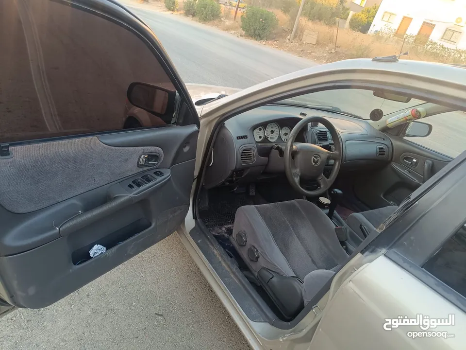 مازدا 323 اتماتك فتحه اصليه تحفه بمعنا الكلمه بسعر حرق 29500 ألف نقدا بدل وارد فحص نخب