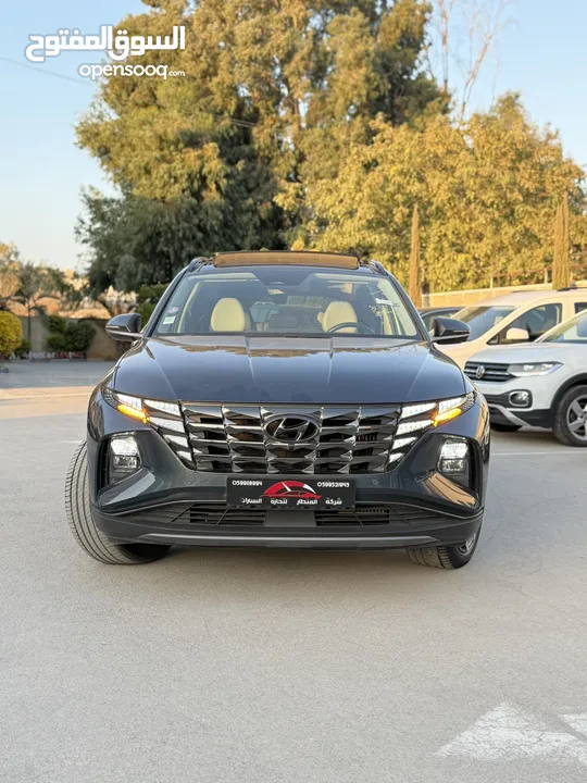 هونداي توسان ترخيص 2022 محرك 1600 هايبرد plug in/يقطع على الشحنه 65 كيلو متر  271 حصان