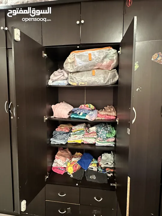 Brown cupboard with additional racks