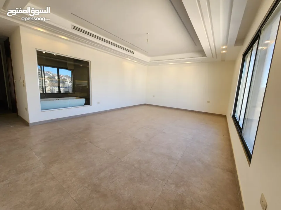 شقة طابقية فاخرة للبيع في عبدون  ref : 14389