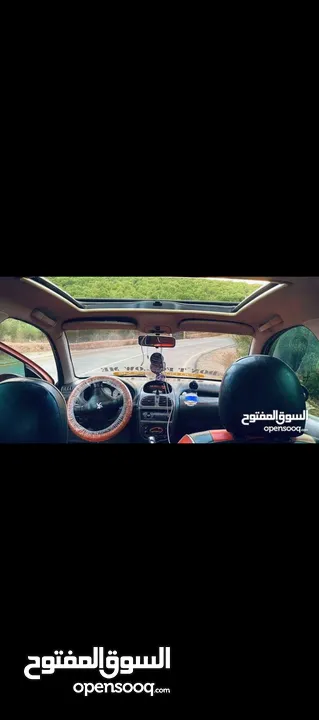 سياره بيجو نظيفه للبيع