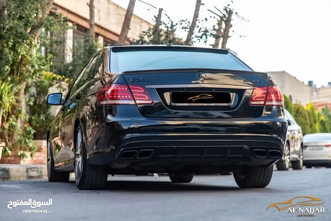 Mercedes E200 Avantgarde Amg kit 2015  السيارة وارد و بحالة الوكالة
