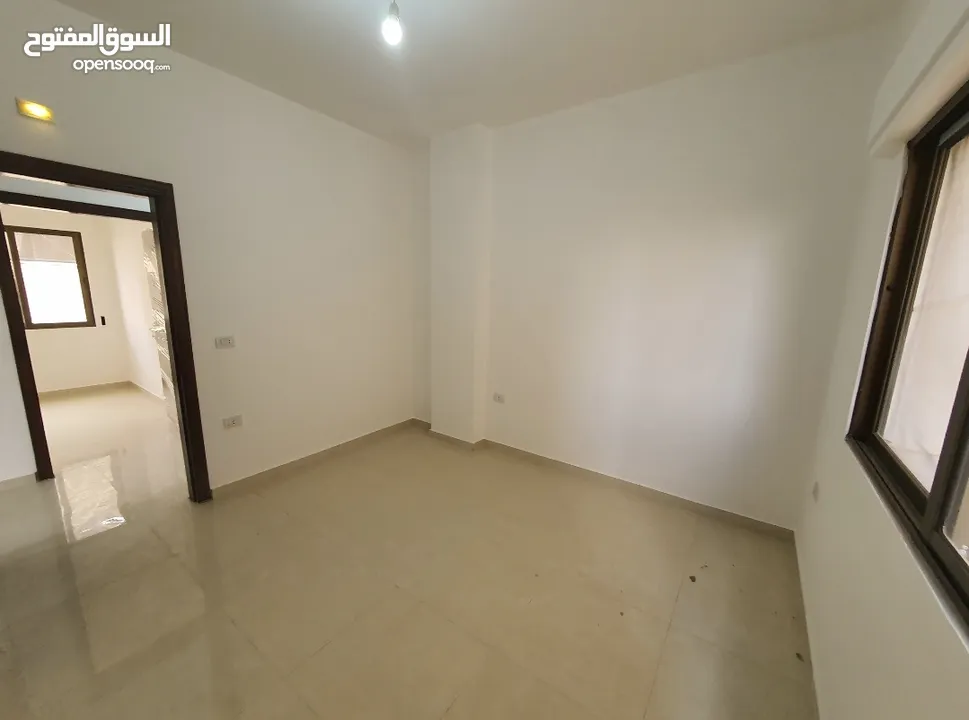 عماره جديده/4 شقق طابقيه للبيع
