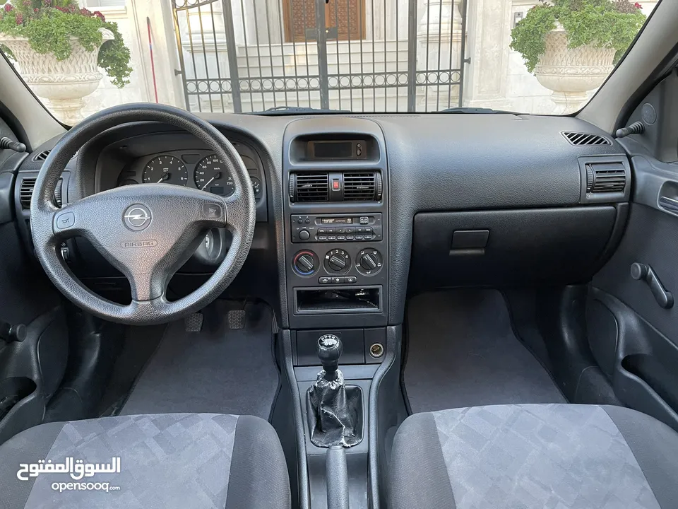 ‎أوبل استرا موديل 2001  وارد الوكالة ومالك واحد فقط من الشركة عداد 100الف كيلو فقط