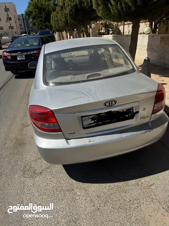 كيا ريو بحالة ممتازة  جير عادي 2004