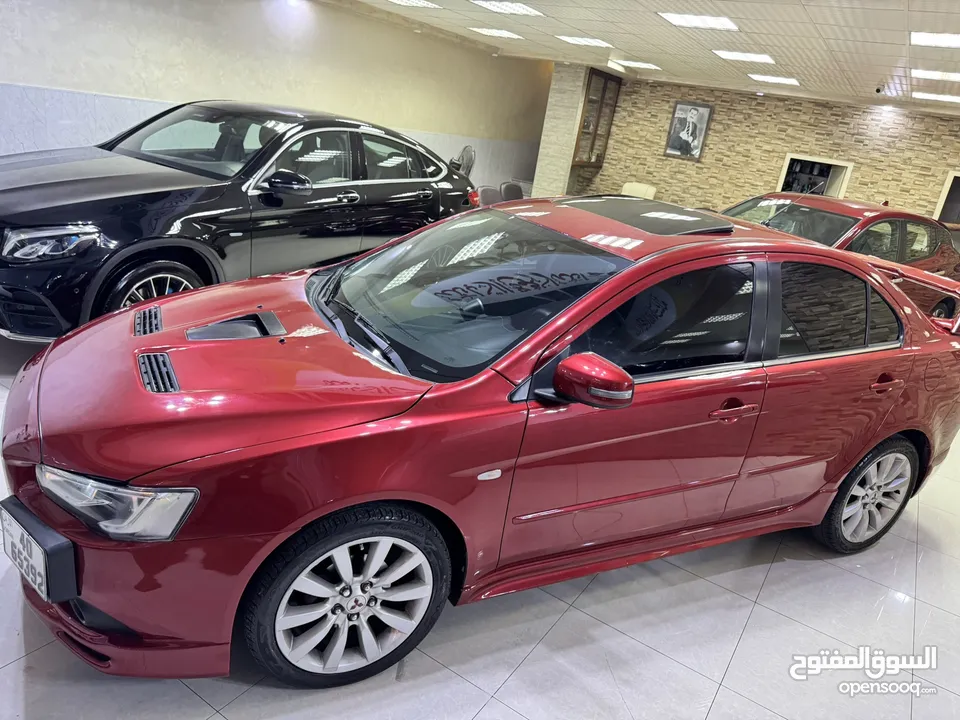 ميتسوبيشي لانسر موديل 2015 GT اصلي فحص كامل بحالة الوكاله فل كامل اعلى صنف من فئتها