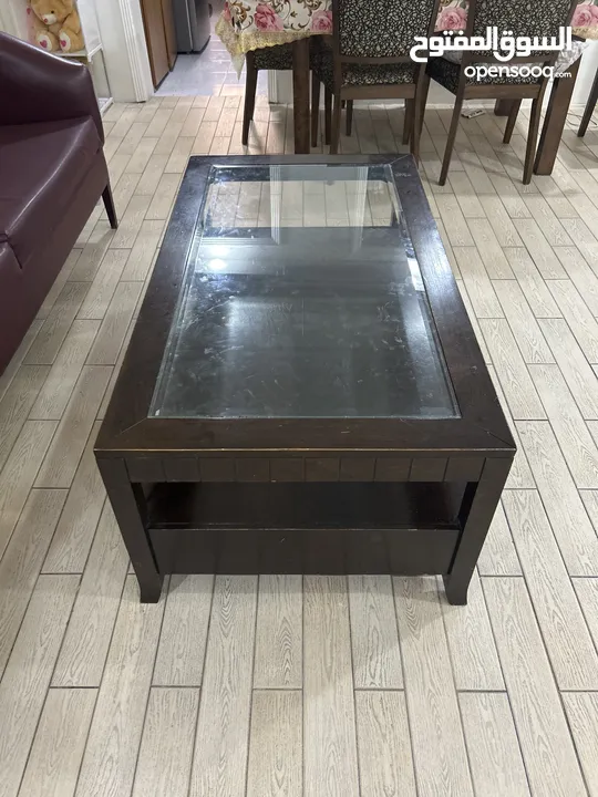 Glass top coffee table wooden
