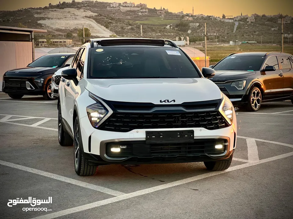 كايا سبورتاج /2022 فل الفل فتحة سقف  2x4 ///240Hp بنزين + كهرباء  ( Haybrid) 1600cc