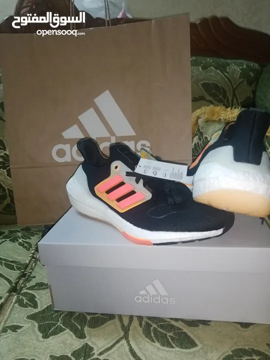 حذاء adidas UltraBoost 22 Black Flash Orange اصلي بنص سعره بسعر مغري جدا الفضل للمشي والراحة