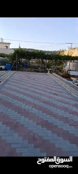 ارض دونم مع عمارة اربع طوابق للبيع