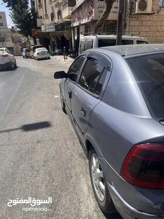 اوبل استرا 2004