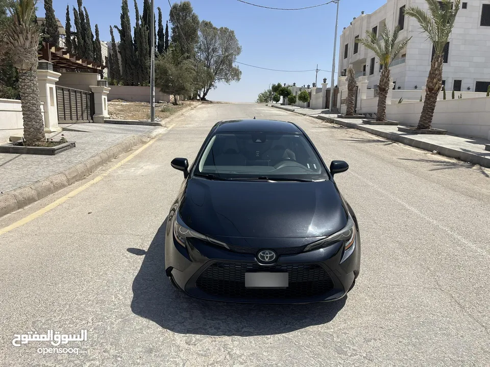تويوتا كورولا 2020 هايبرد لون اسود حره باسم المستورد