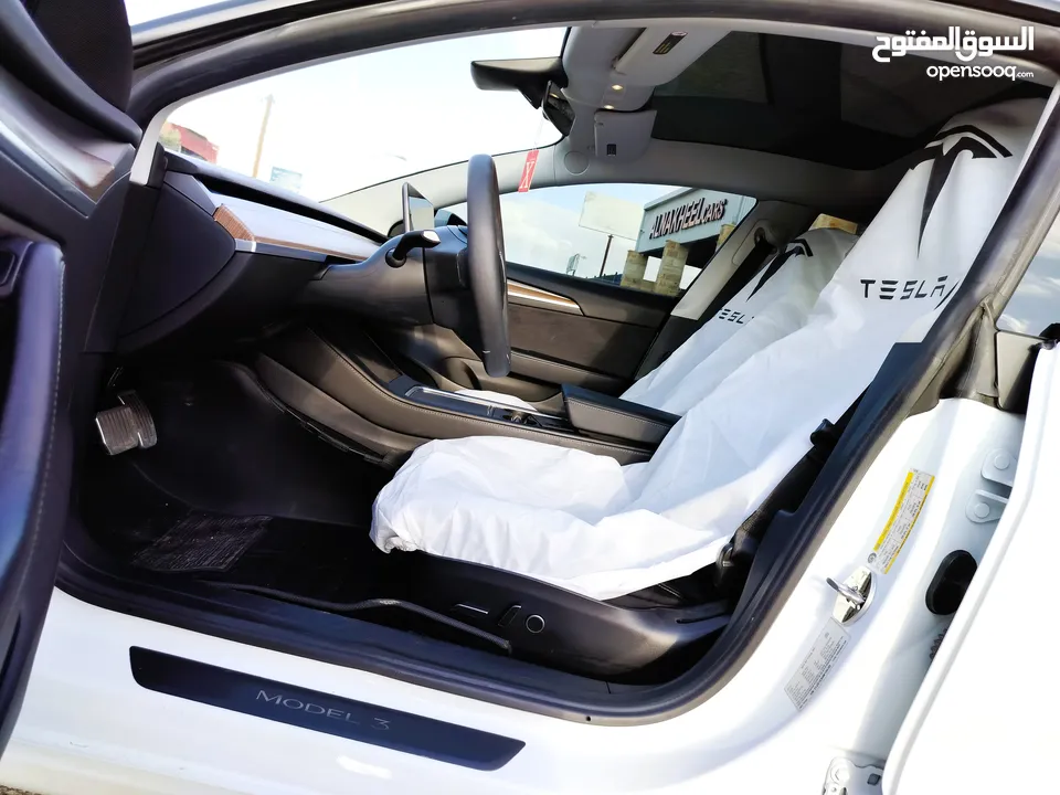 تيسلا 2022 model 3 بحالة الوكالة فحص كامل اوتوسكور +B لون مميز في الحرة للبيع بسعر لقطة ومحرووووق