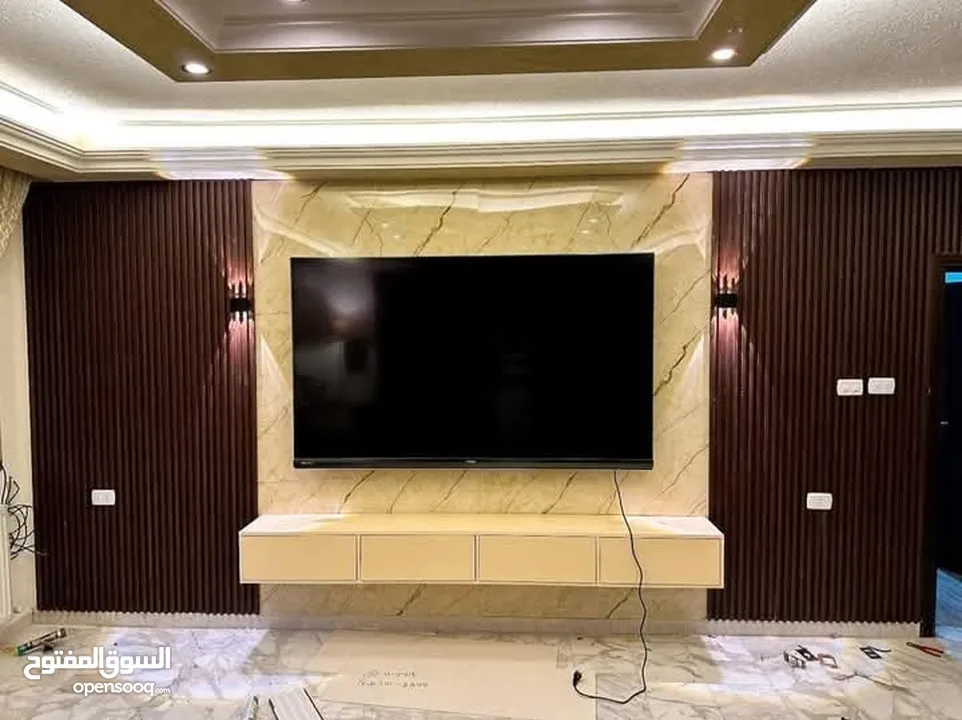 ورق جدران والشيبورد وبانوهات باركيه بديل الرخام وبديل الحجر والقرميد والفاير بليس وجبسن بورد