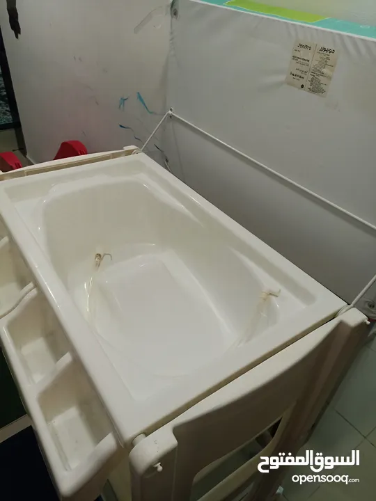 Juniors baby changing table with built-in tub