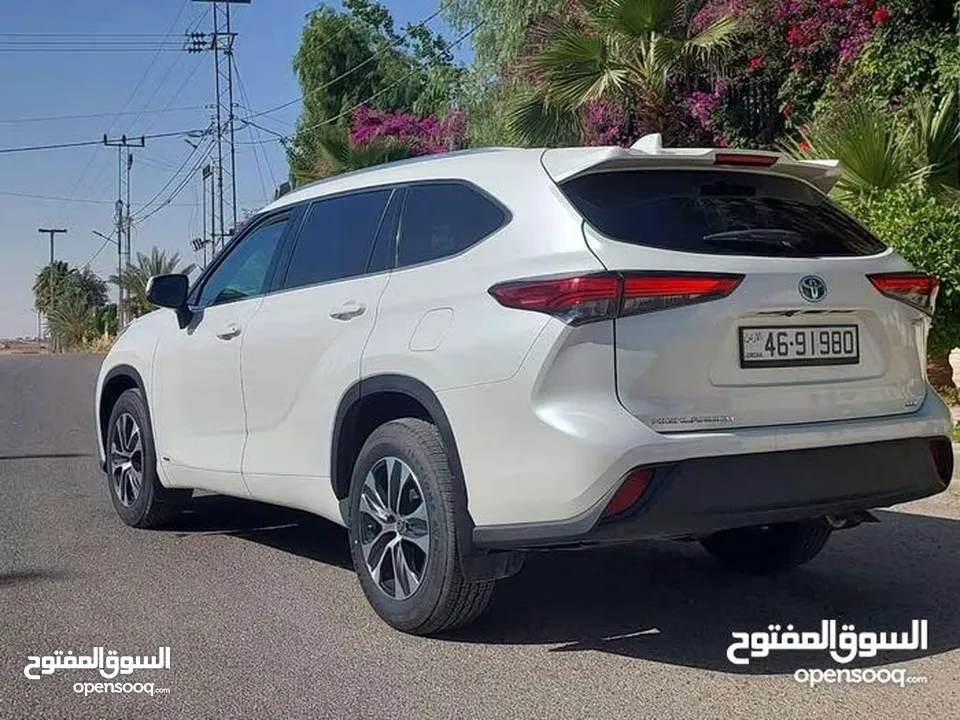 تويوتا هايلاندر 2021 فحص 2 جيد فل الفل بفتحه لون ابيض لؤلؤي بسعر مغري قابل للبدل