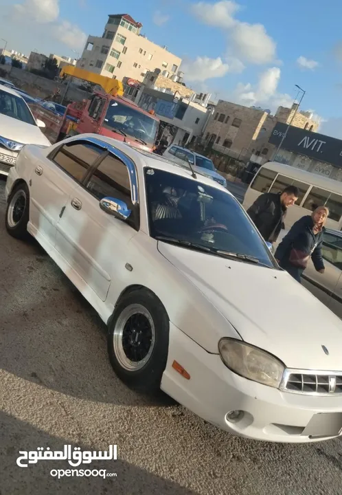 كيا سبكترا موديل 2000 لون ابيض للبيع بسعر مغري