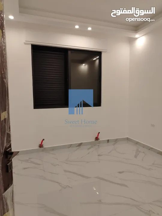 شقة أرضية فاخرة للبيع في خلدا - قرب إشارة البنك العربي 145م مع حديقة وترسات 120م لم تسكن