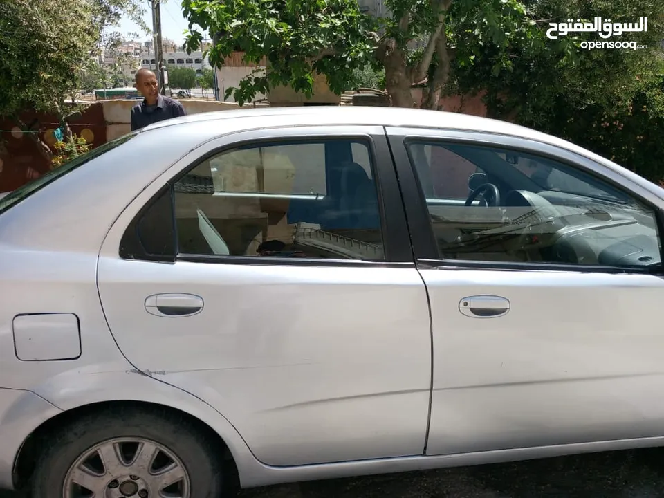 شفروليت افيو موديل 2005  1600 سعةالماتور  فحص خالي قص قلبان بحاجه كوشوك