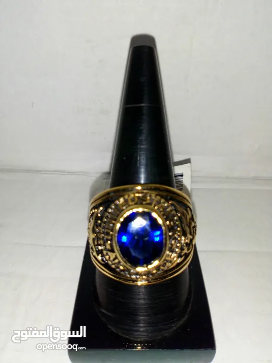 خاتم أمريكي حجر ازرق زفير واحمر روبي مطلي بالذهب عيار 18حجر أصلي