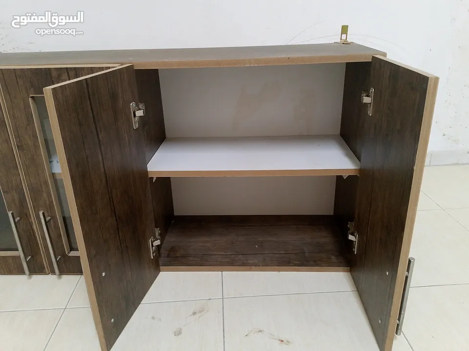خزانة مطبخ خشب 3 ابواب جداريه   نوع mdf مستعمله بحاله ممتازه