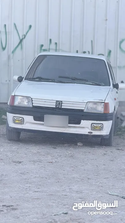 سيارة بيجو 205