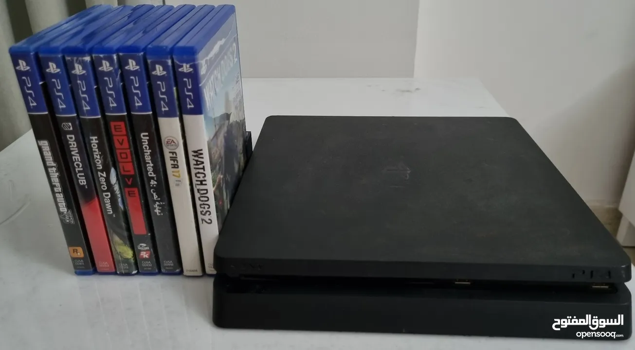 PS4 BUNDLE - (With 6 GAMES, 1 Controller & Game Stand )  Price is Negotiable