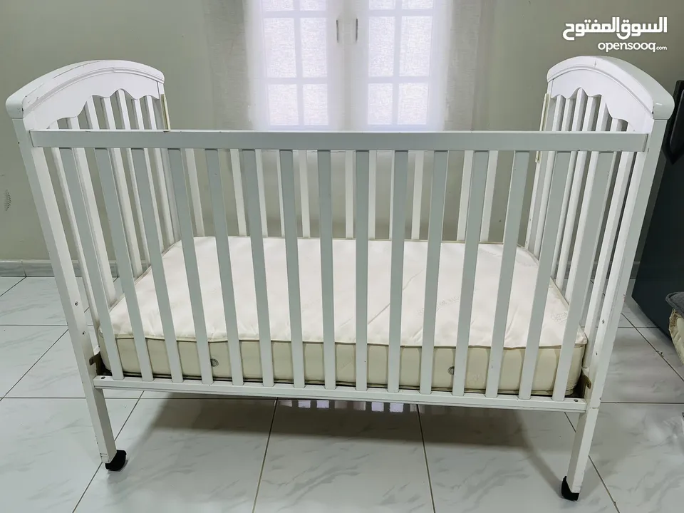 Juniors brand baby cot and mattress