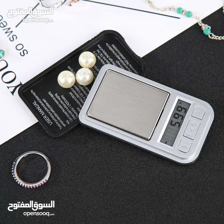 ميزان الكتروني صغير و دقيق  يحتاجه كل بائع ذهب مع محفظه صغيره