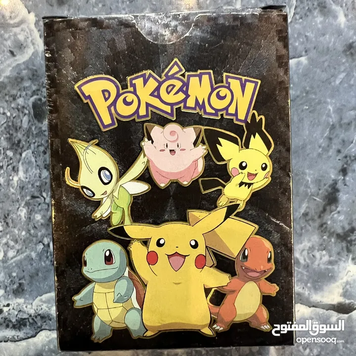 كروت بوكيمون والبومات (Pokemon cards and binders)
