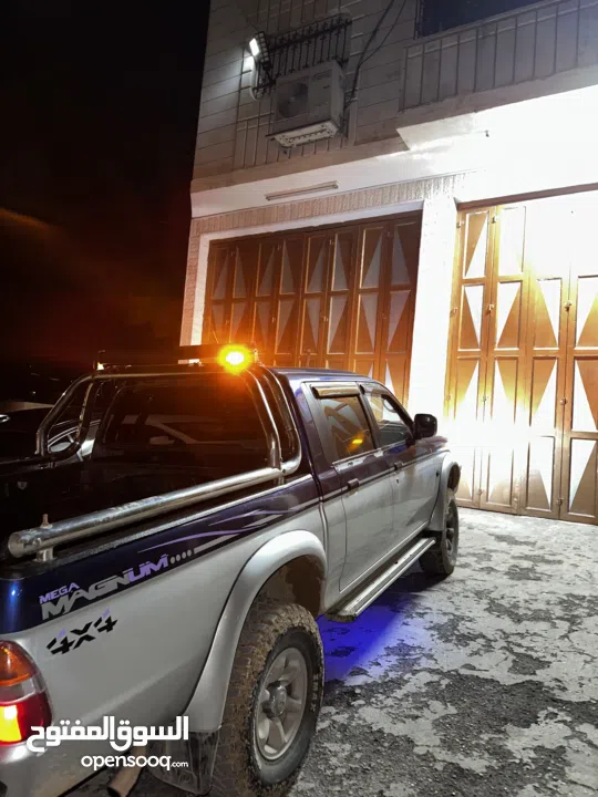 متسوبيشي ماقنومL200 2001