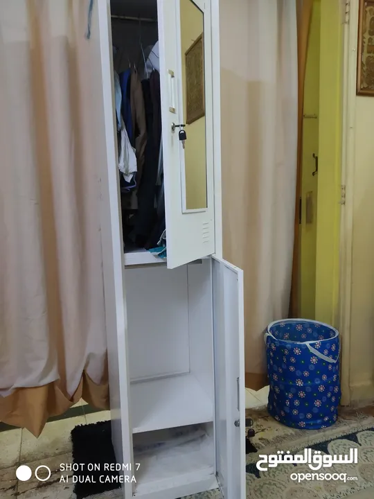 WHITE FOLDABLE CUPBOARD. Light in weight . easily moveable.