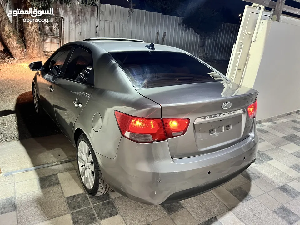 كياااا فورتي 2010 مطور 1600 بنزين جير اتوماتيك فل الفل اضافات سياره بصلاه ع النبي