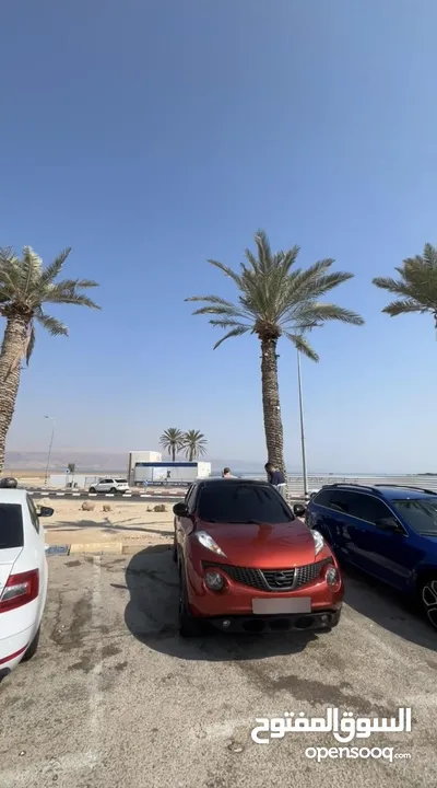 نيسان جوك 2012  محرك 1.6  توماتيك  جير مطور 100% ع الفحص  خالية من الضربات مغير لون على نضاف  يد2