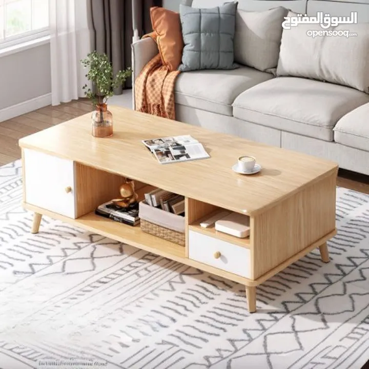 طاولة صالون عصرية متعددة الاستخدامات بتصميم أنيق يجمع بين البساطة والعملية لتكون قطعة مثالية في غرفة