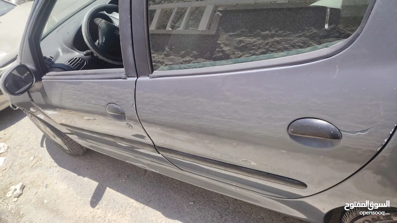 بيجو 2007 موديل 206 فحص كوم حديد 1300دينار