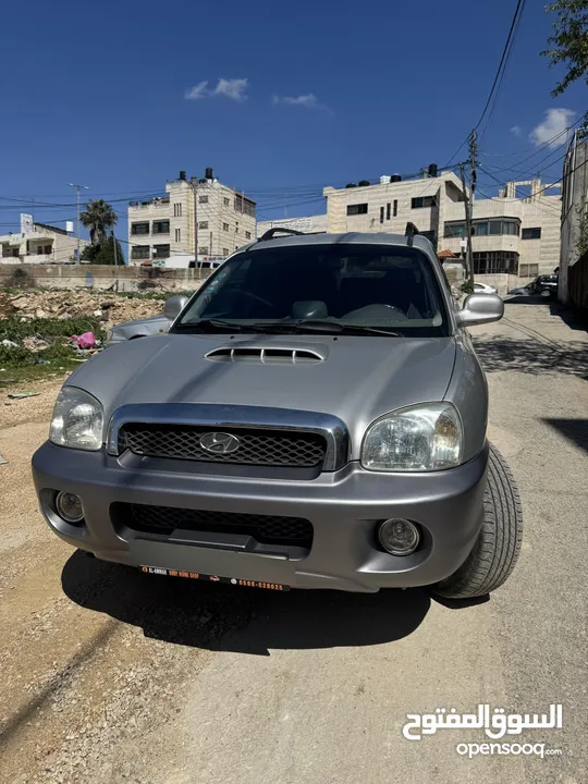 هيونداي سنتافيه فل اضافت ماعدا فتحة 7 ركاب اتوماتيك ديزل موديل 2002 فحص 100٪؜ خالي من المشاكل