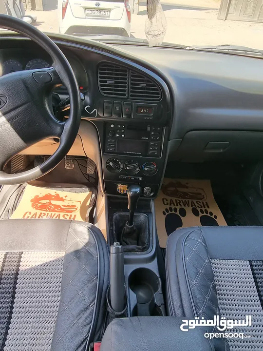 كيا سبيكترا 2001 بسعر 2400 جير عادي سياره نظيفه جدا  kia spectra 2001