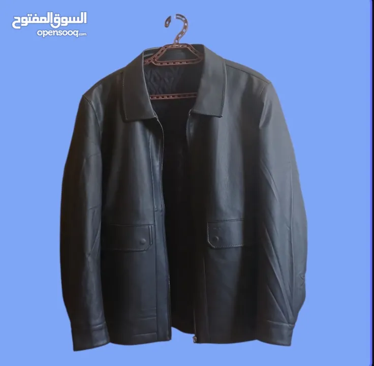جاكيت جلد أسود أنيق حجم L (شبه جديد)