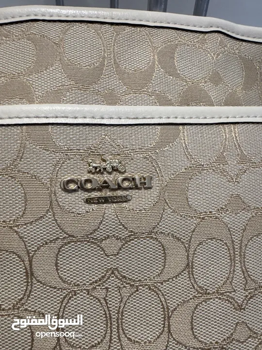 Coach signature canvas cross body bag